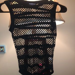 Black mesh body suit.